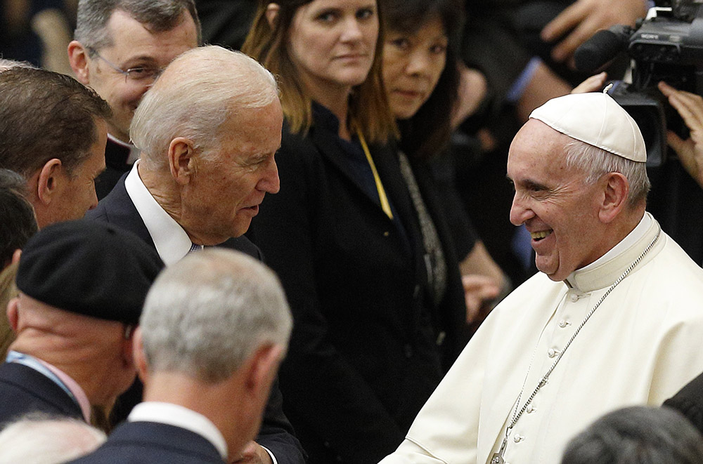 Then-U.S. Vice President Joe Biden meets Pope Francis after both leaders spoke at a conference on adult stem cell research at the Vatican in April 2016. (CNS/Paul Haring) Then-U.S. Vice President Joe Biden meets Pope Francis after both leaders spoke at a conference on adult stem cell research at the Vatican in April 2016. (CNS/Paul Haring)